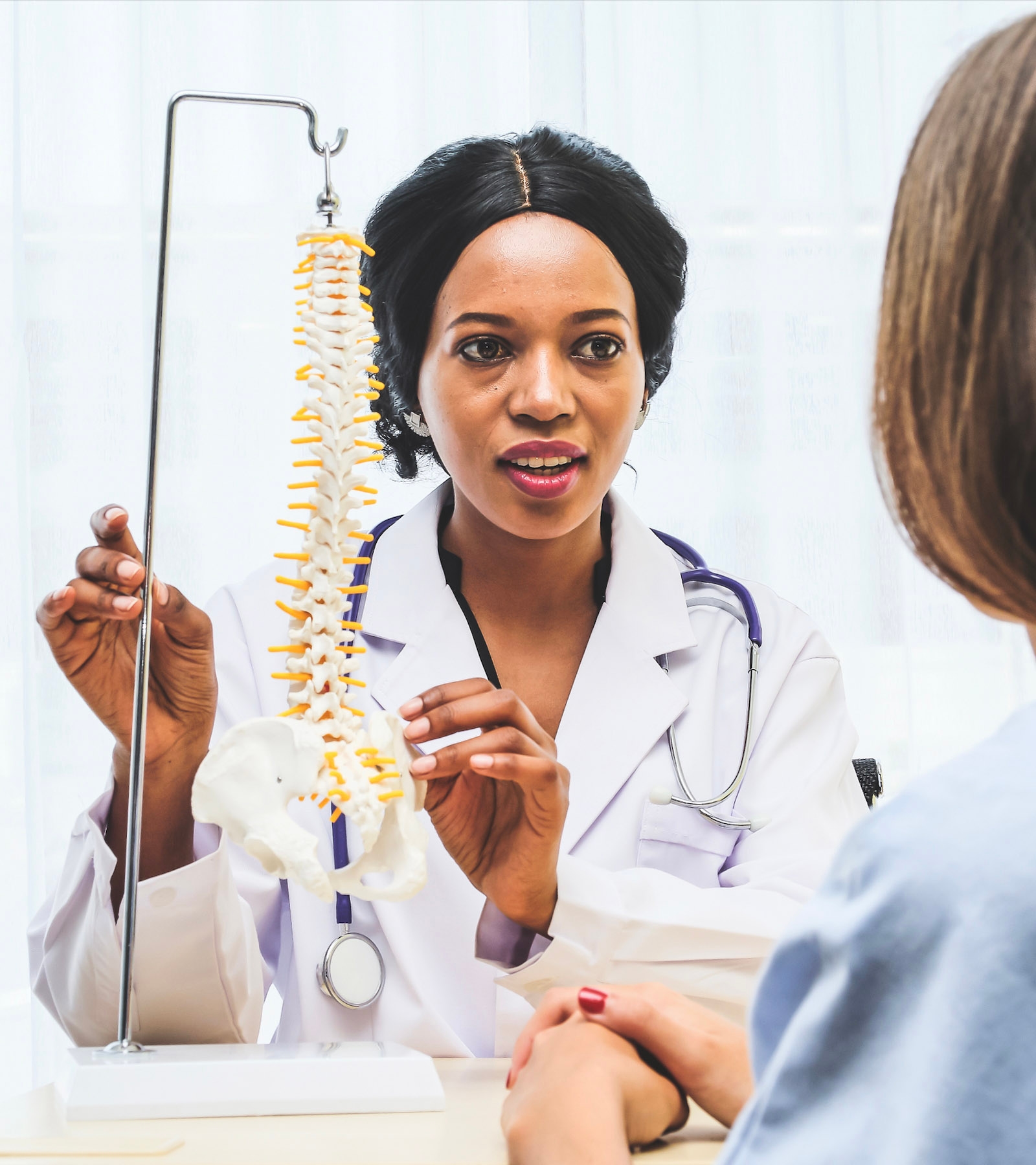 Doctor explaining a procedure to a patient